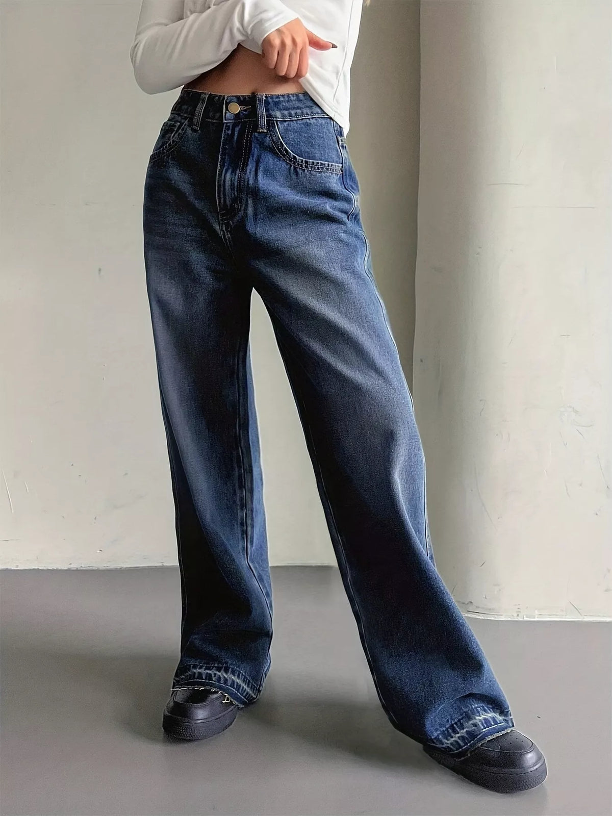 Back view of vintage wash wide leg denim