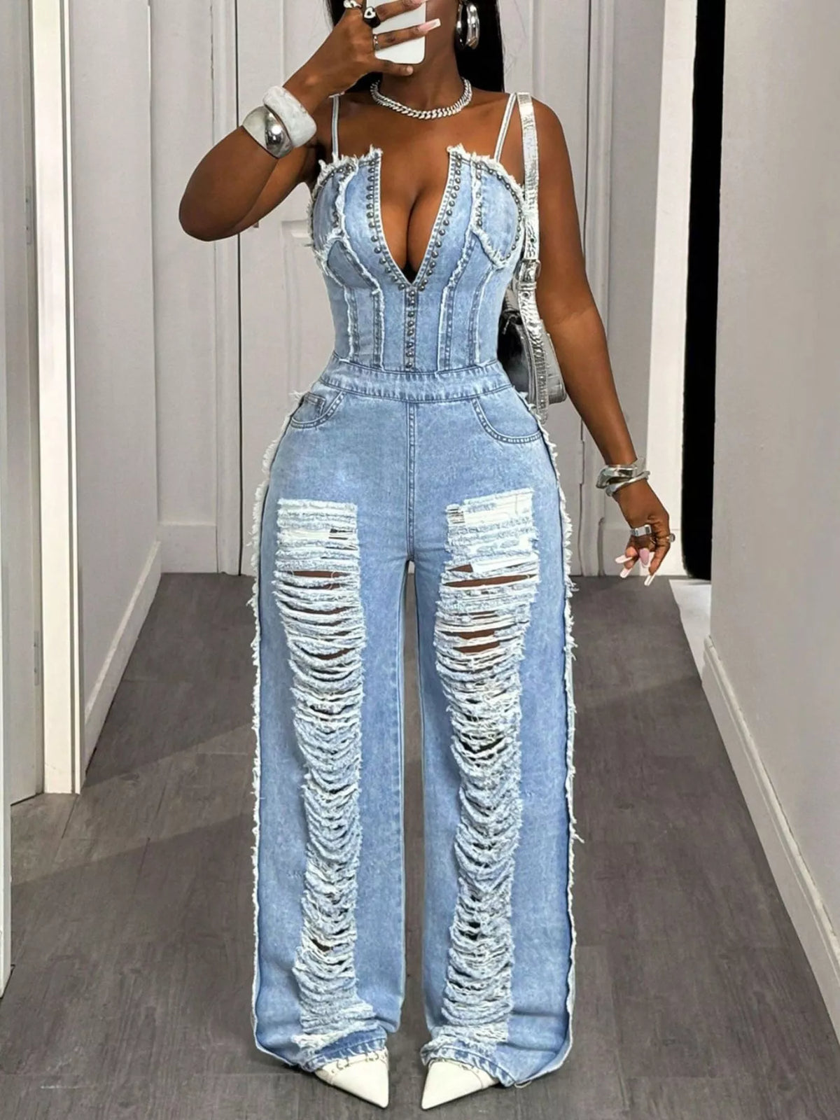 Close view of the distressed denim fabric