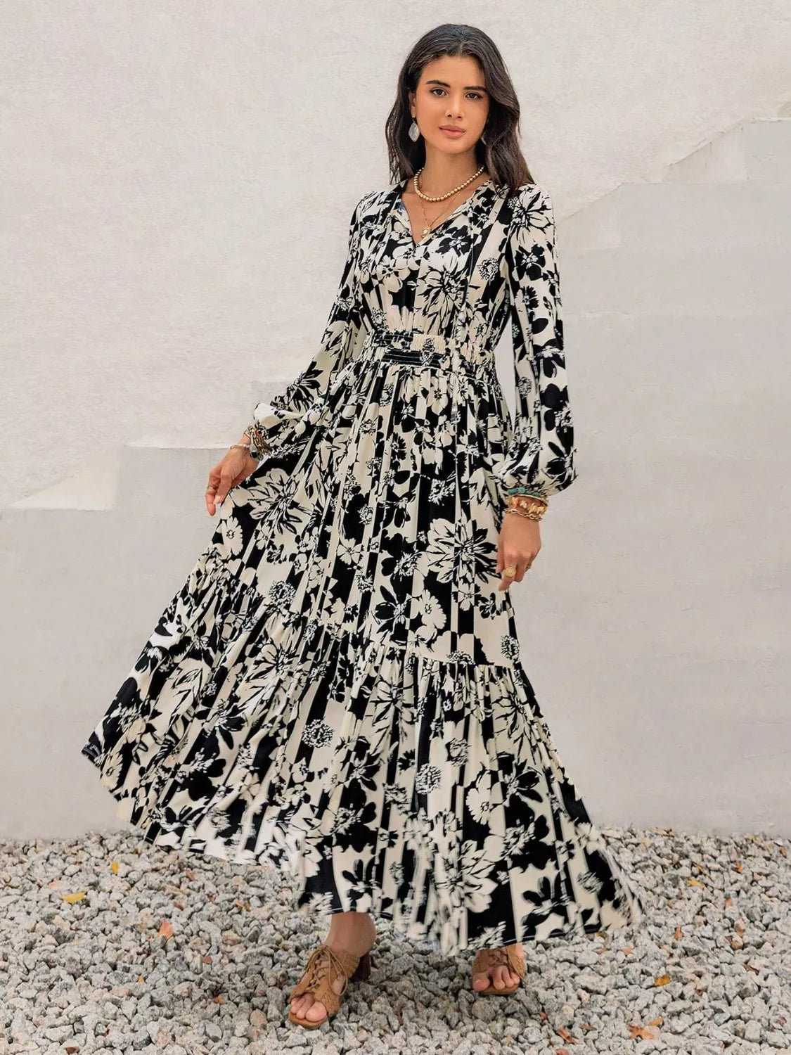 Plus size floral balloon sleeve maxi dress in black three quarter view
