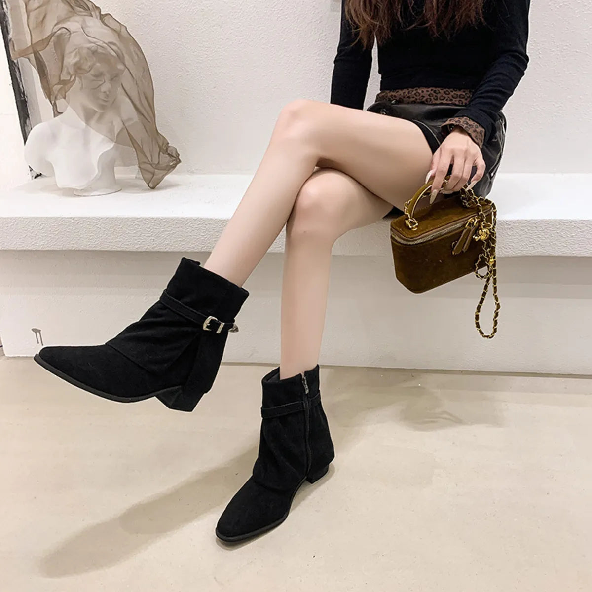 Point toe block heel boots side profile