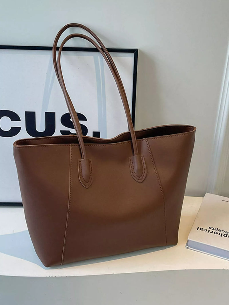 Dark brown leather tote bag front view