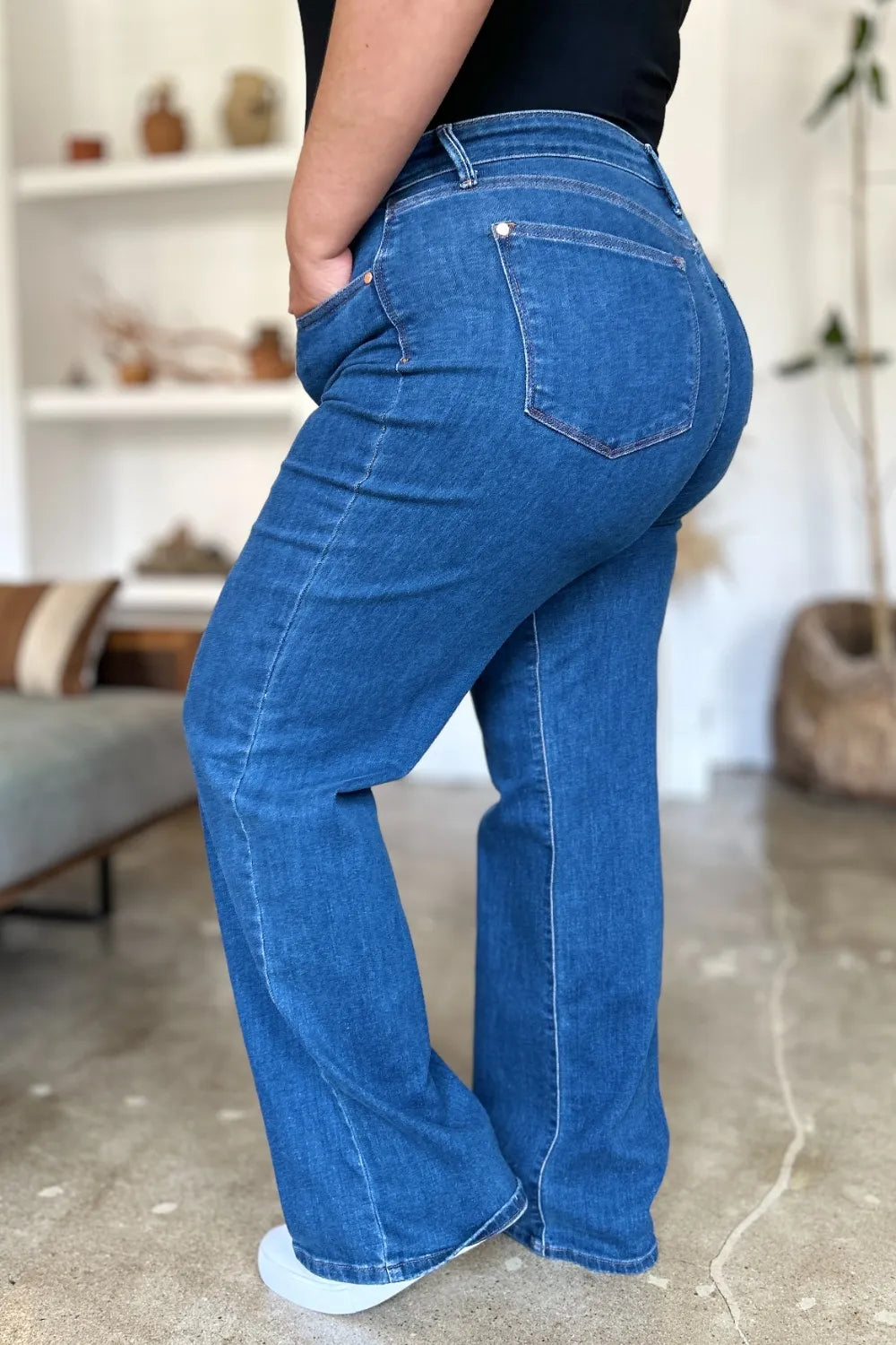 Side view of the high rise denim jeans