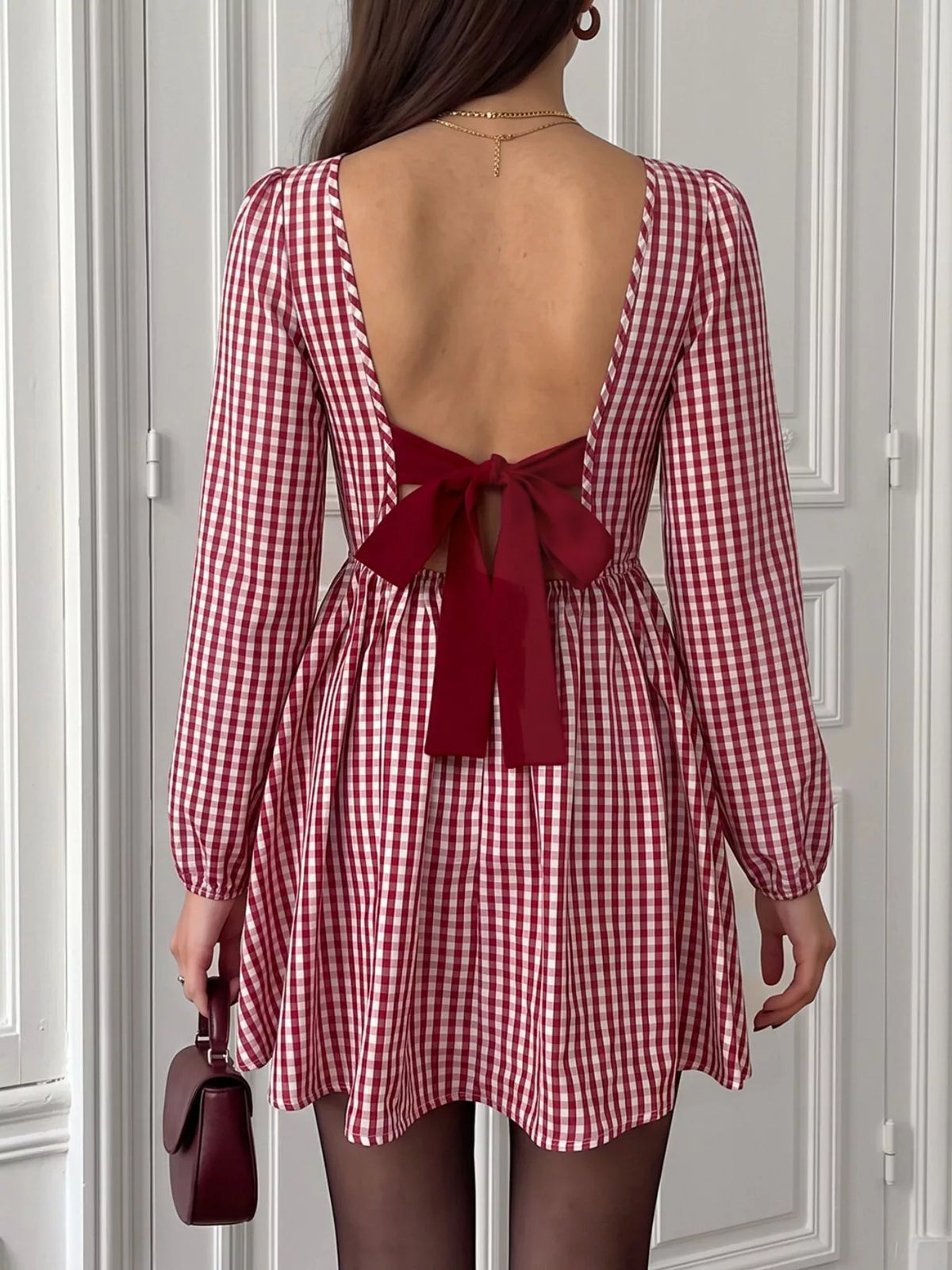 Red plaid dress three quarter view on model