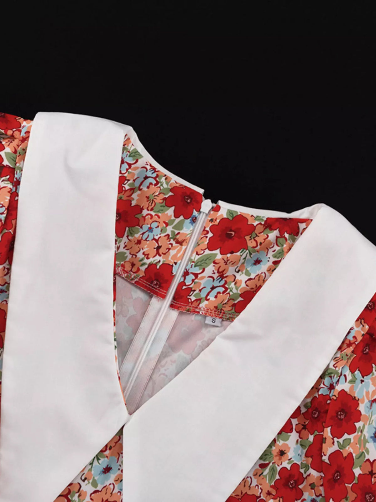 Floral puff sleeve dress three quarter angle