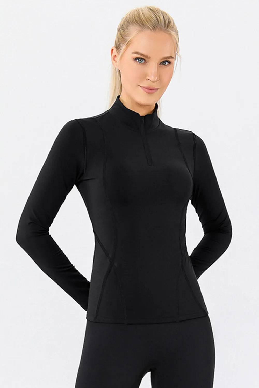mock neck quarter zip active top on model view