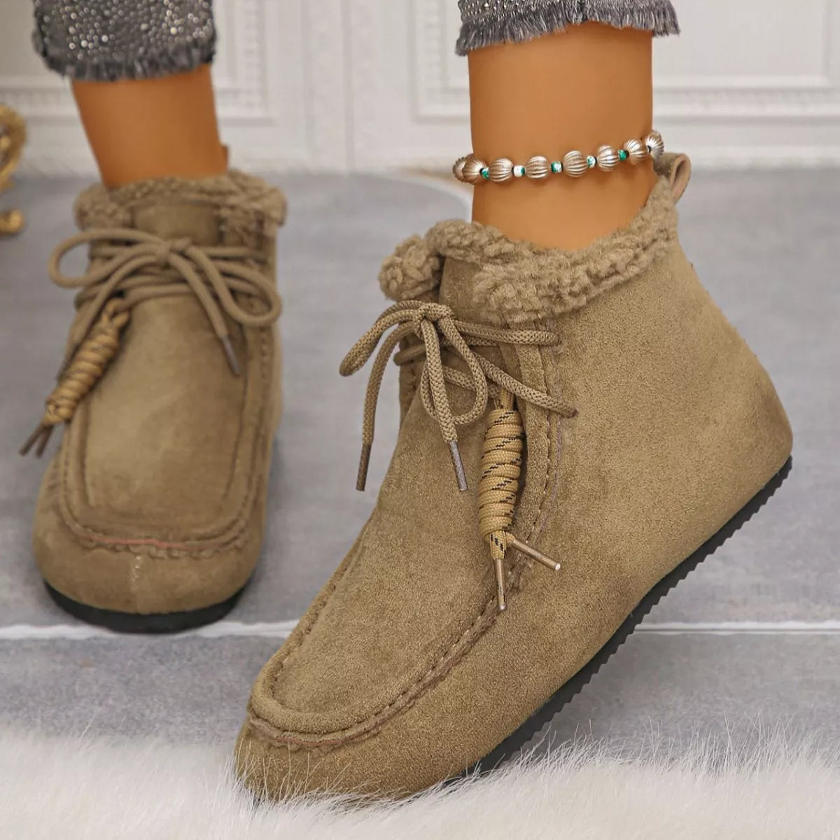 Plush lined ankle boots angled pair shot