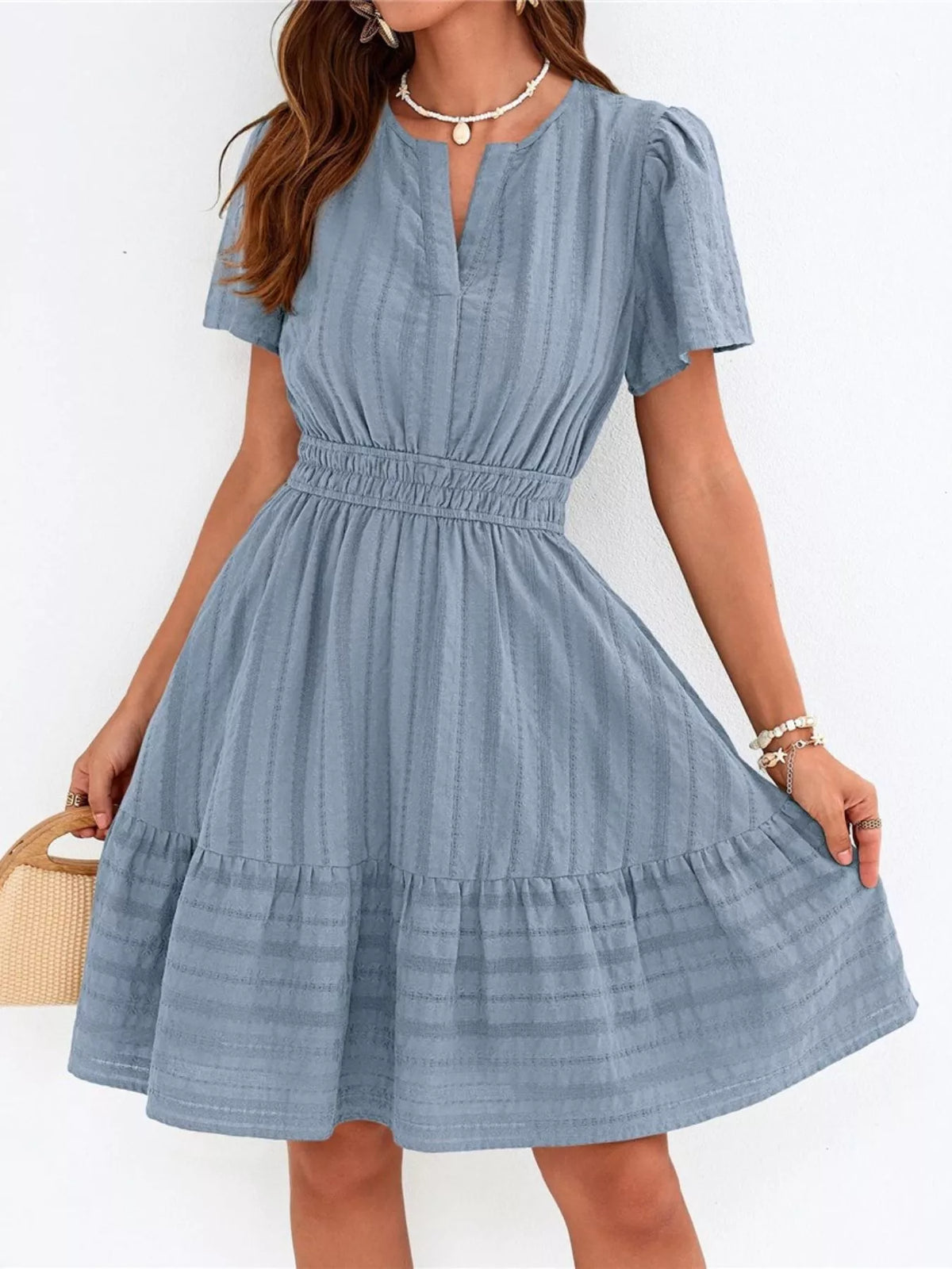 Short sleeve smocked waist tiered midi dress detail view