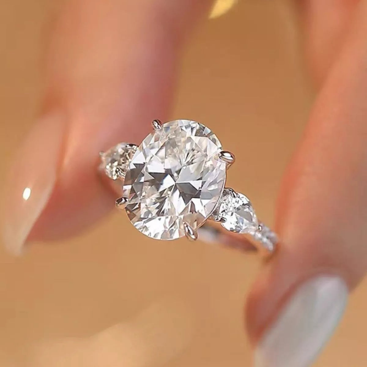 Moissanite oval ring shown on the finger