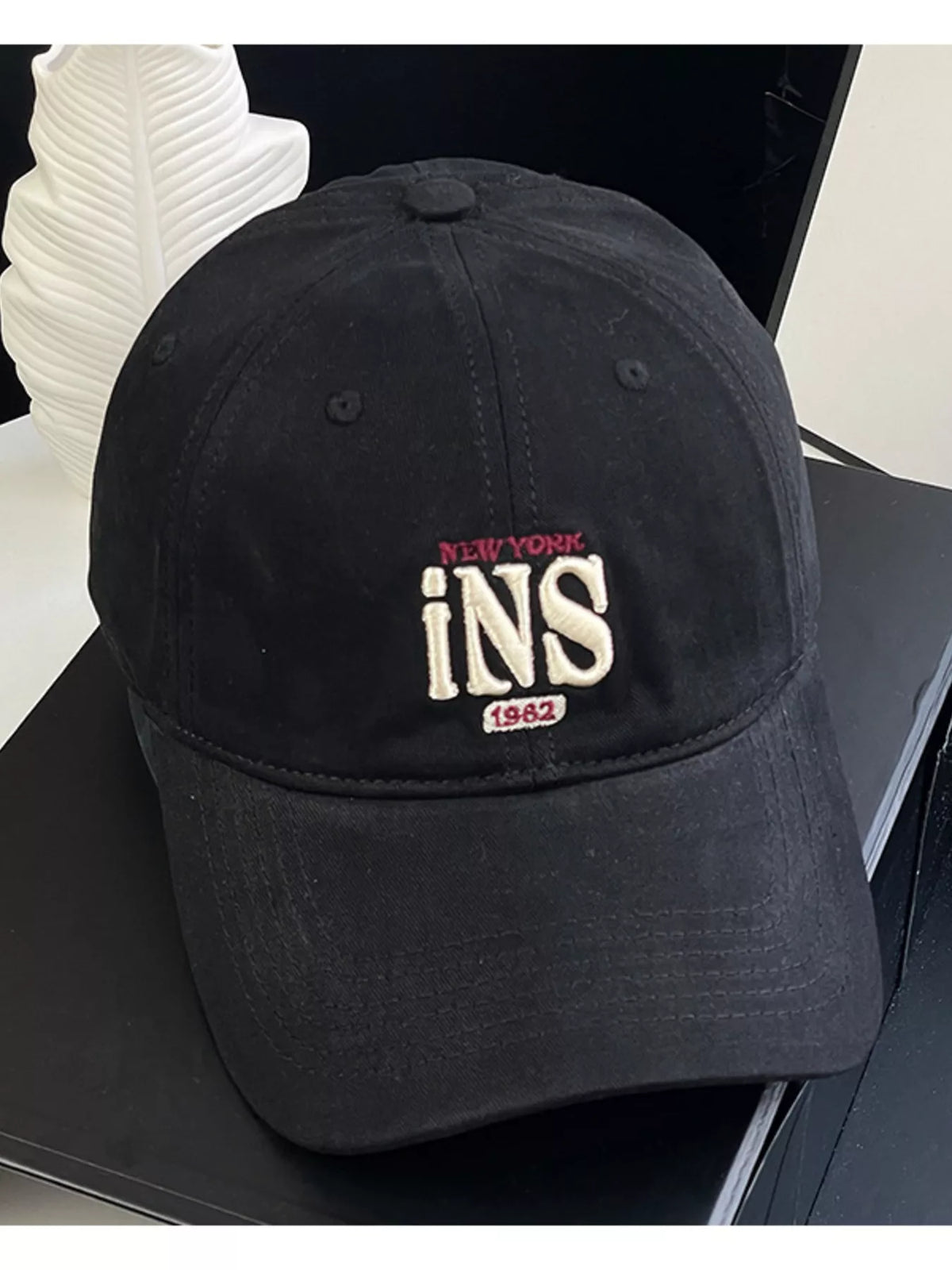 Underside of the brim on the cotton baseball cap