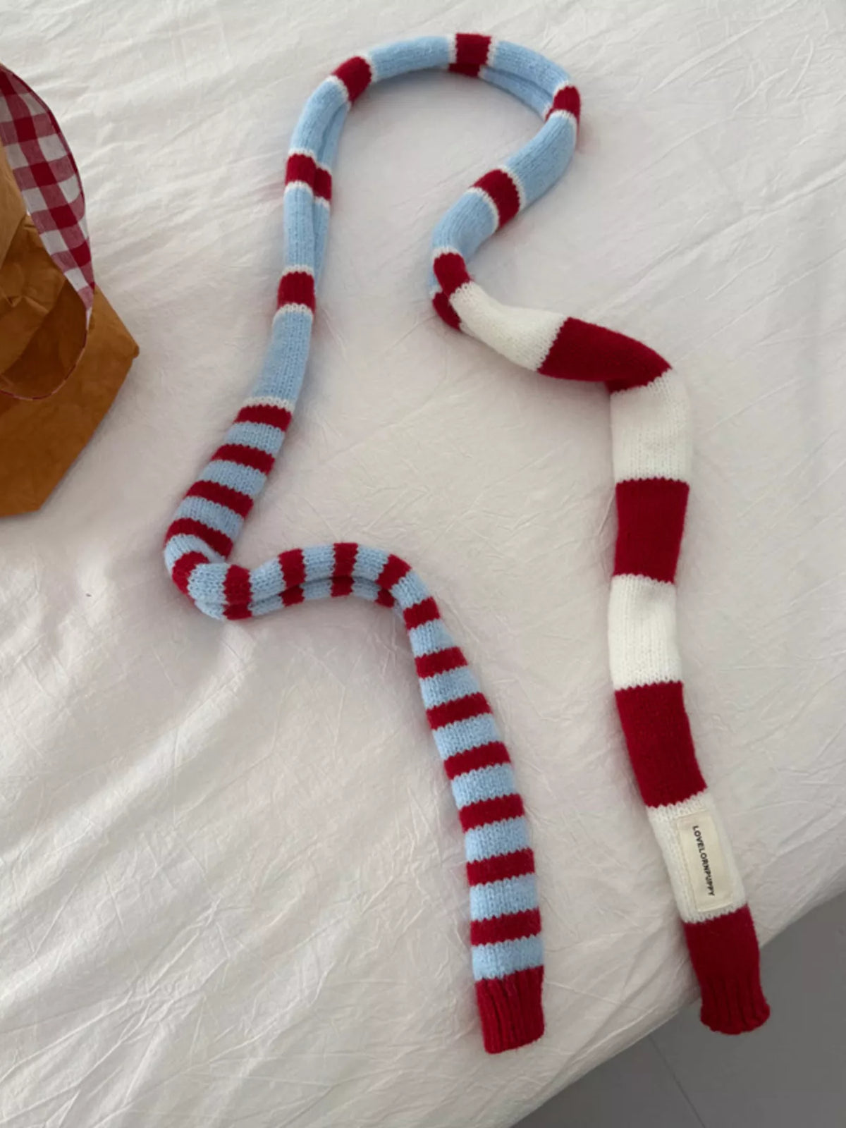 Cozy knit scarf with cheerful stripe pattern