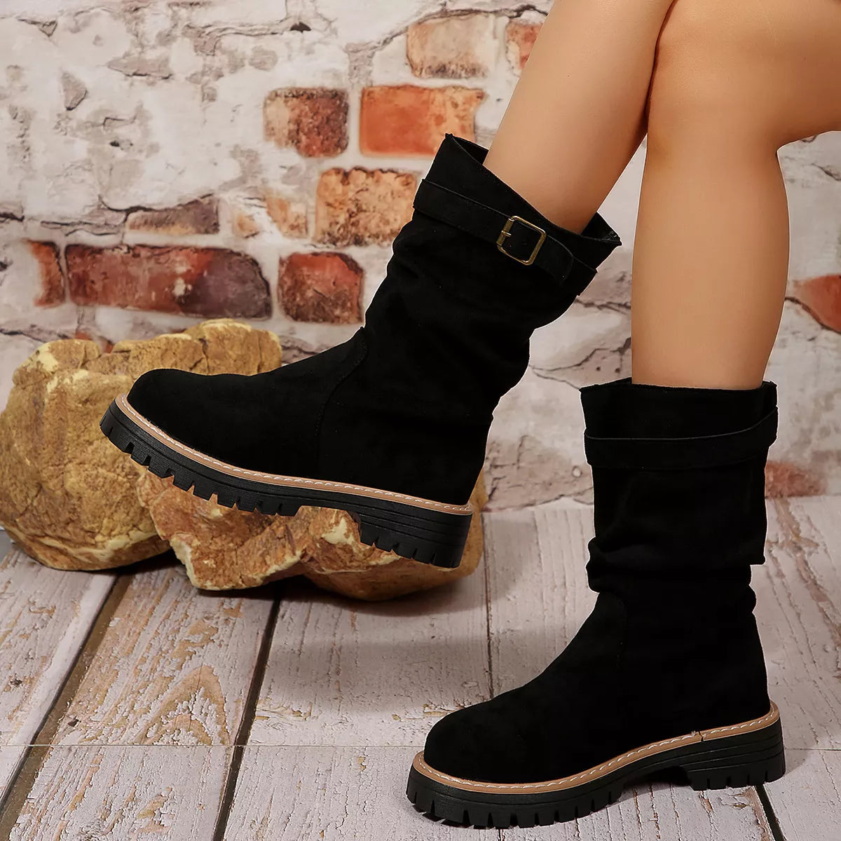 Buckle accent slouch boots front view