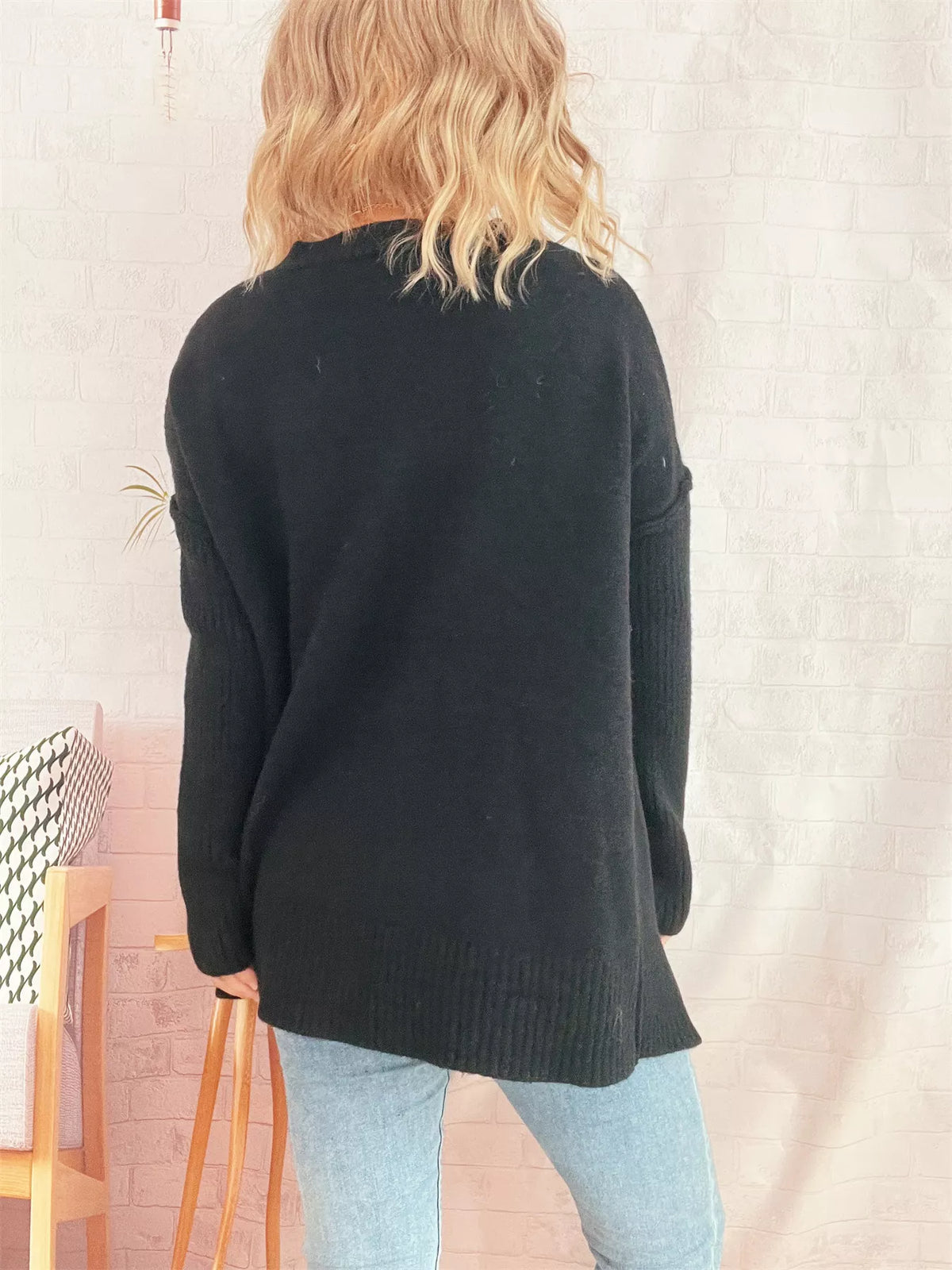 v neck dropped shoulder sweater texture detail