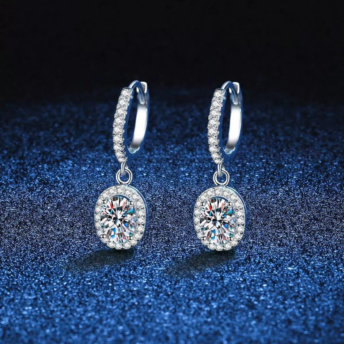 1 carat moissanite drop earrings in 925 sterling silver shown as a pair