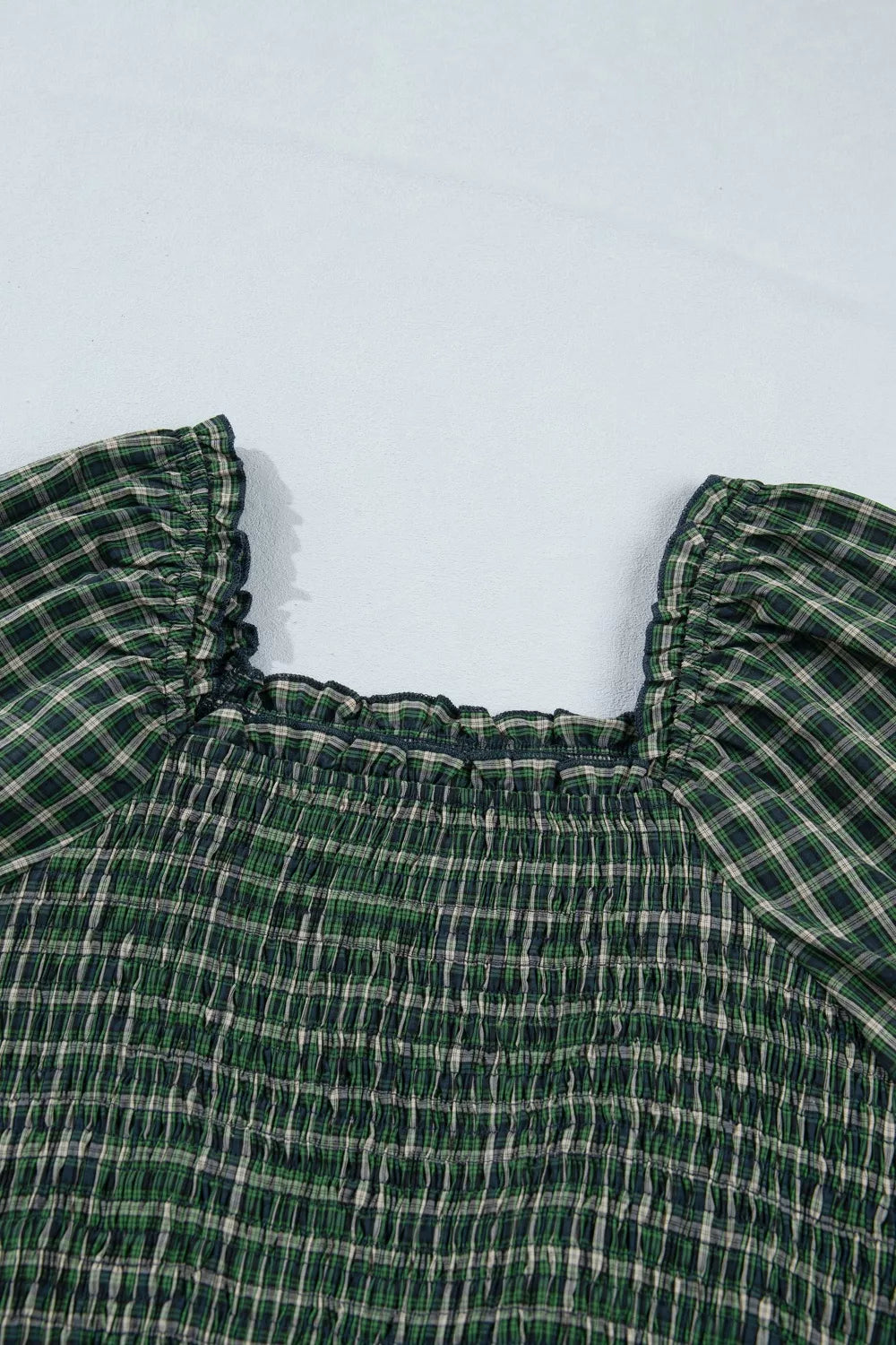 Plaid maxi dress styled with flat sandals