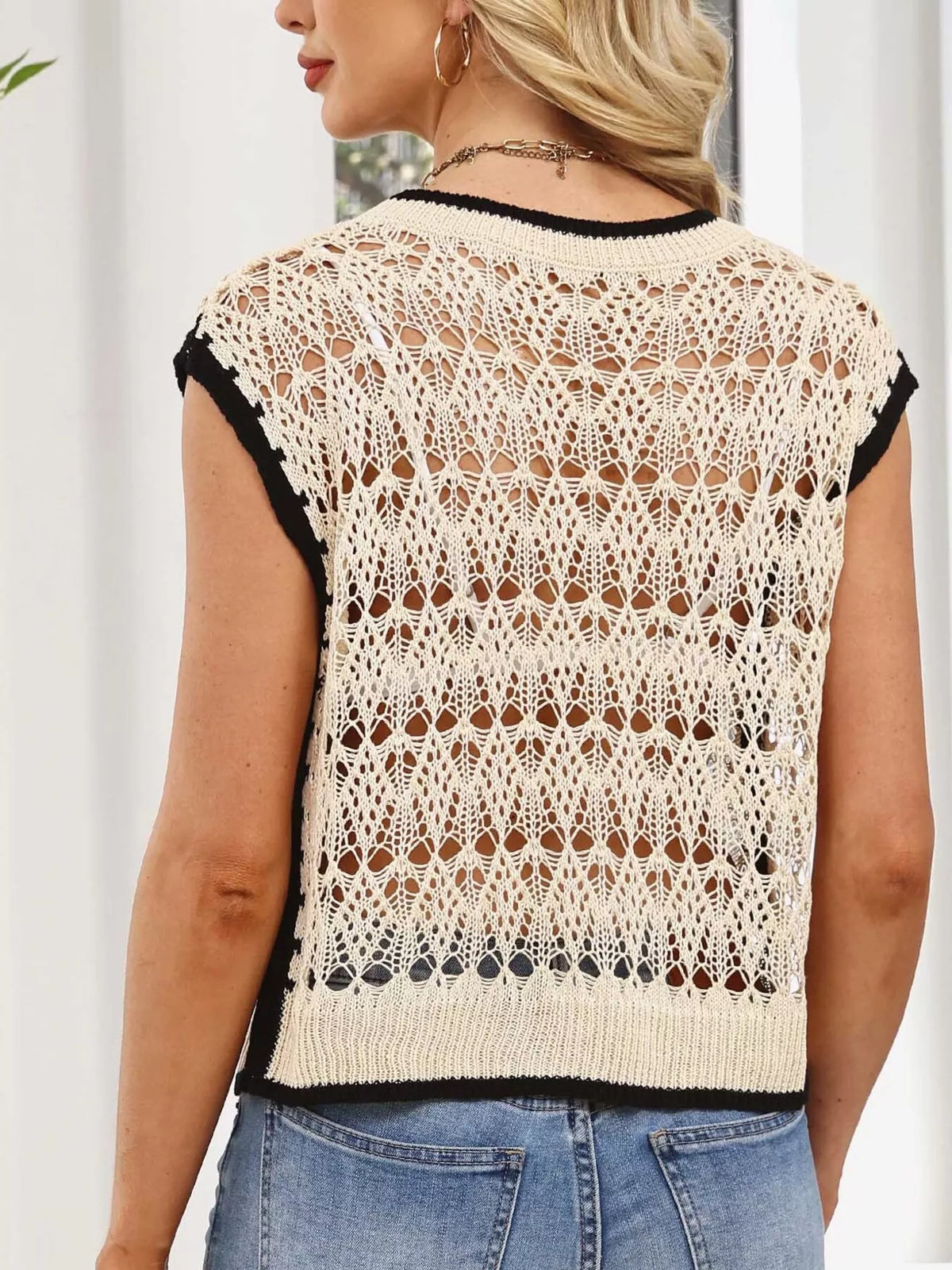 Tan crochet top on model