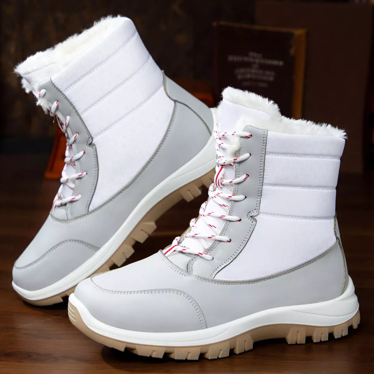 Winter fur lined snow boots standing pair