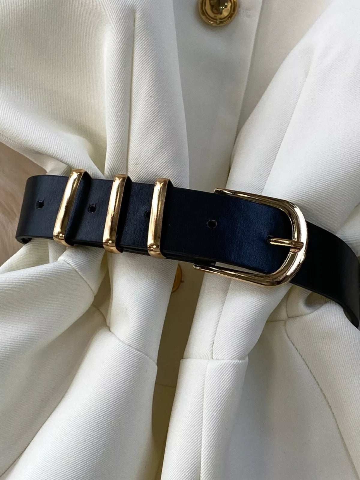 Sleeveless top belted waist detail