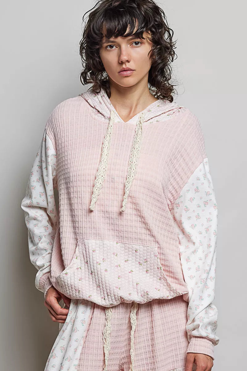 Pink multi mixed knit hoodie with contrast print sleeves front view