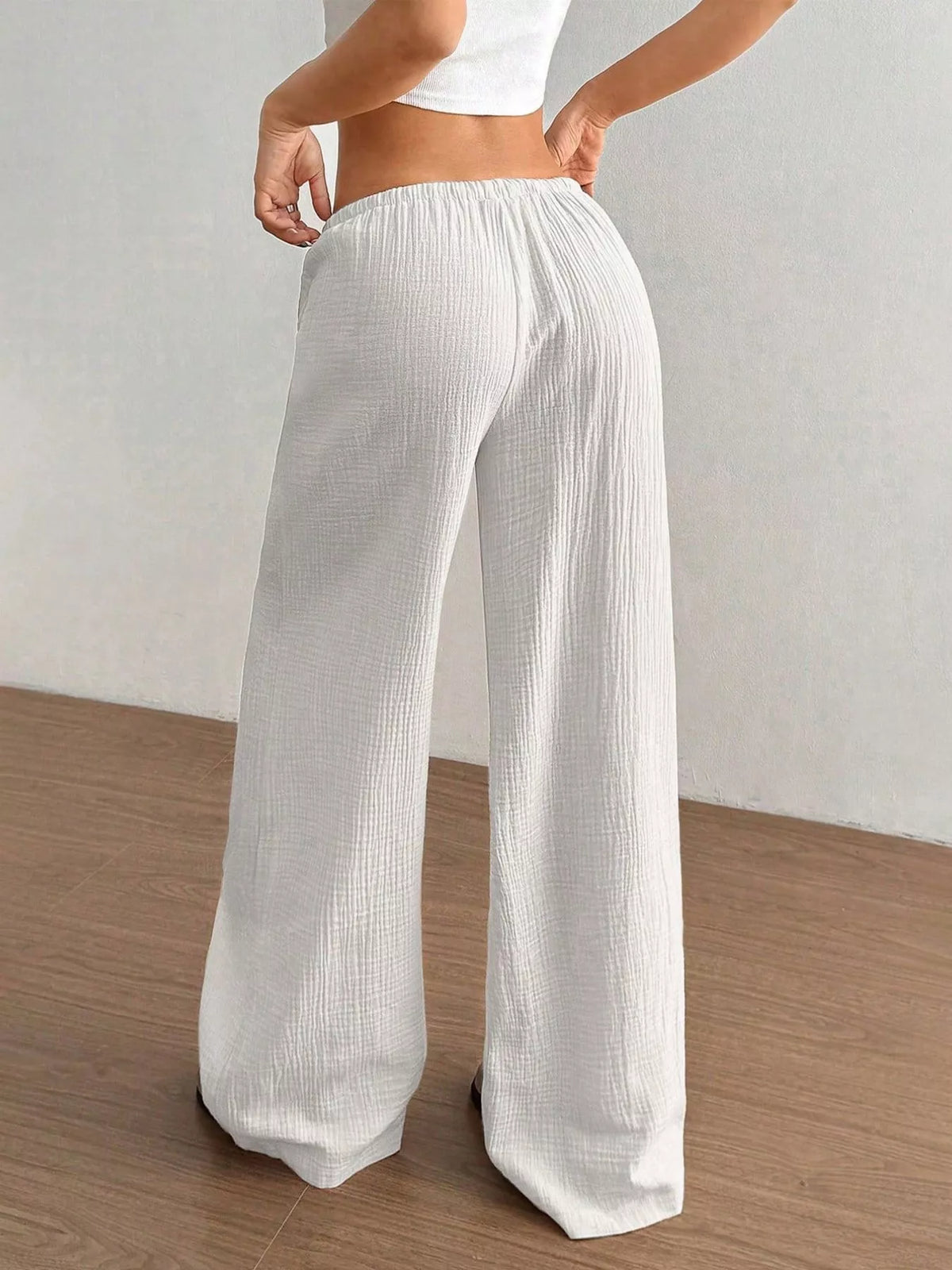 Wide leg pants styled with a fitted tank