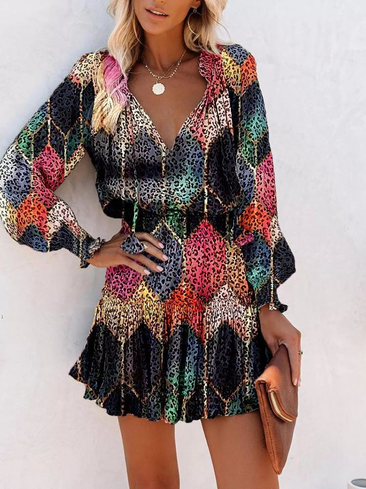 Tie neck lantern sleeve tiered dress flat lay view