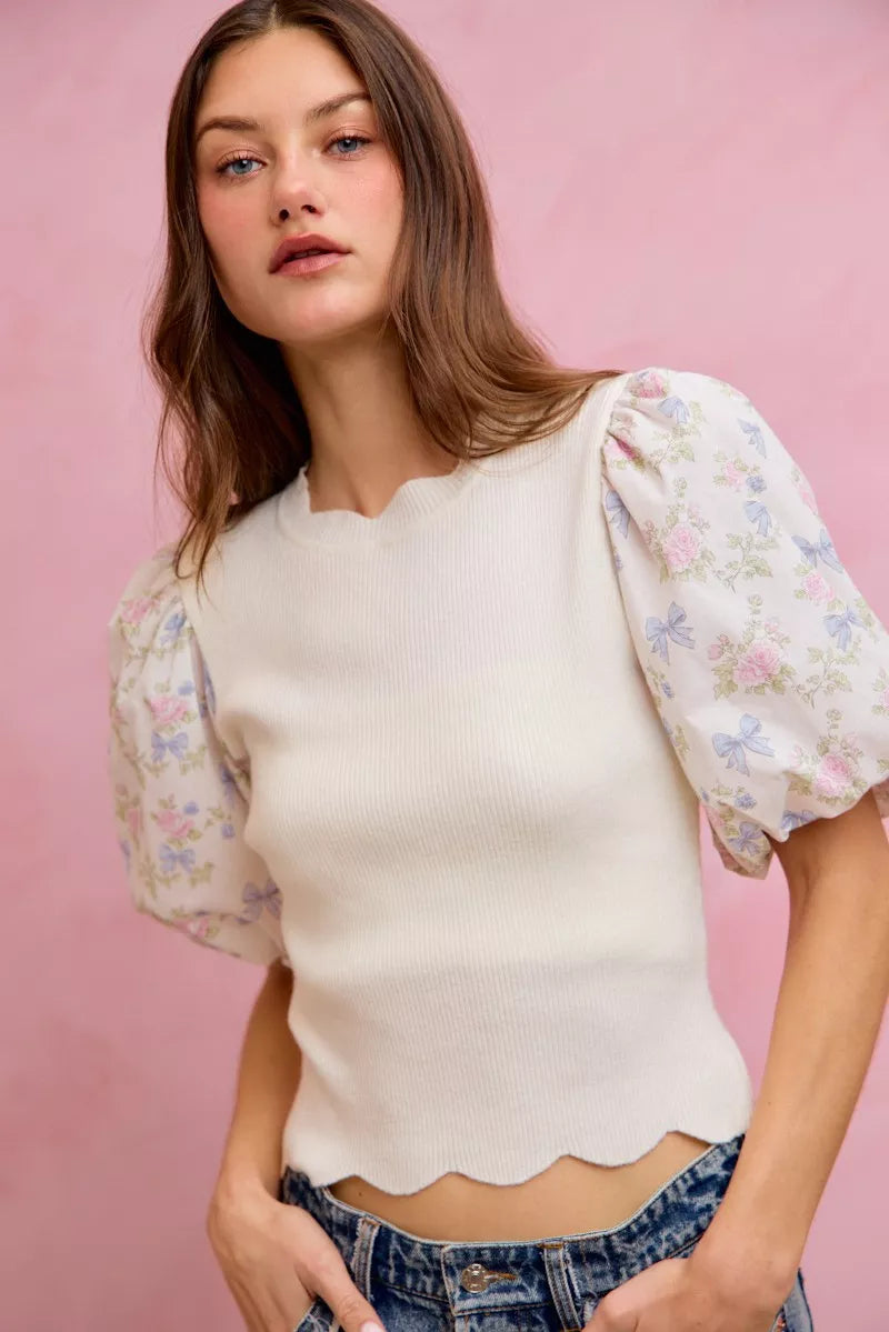 Floral sweater top styled with light skirt