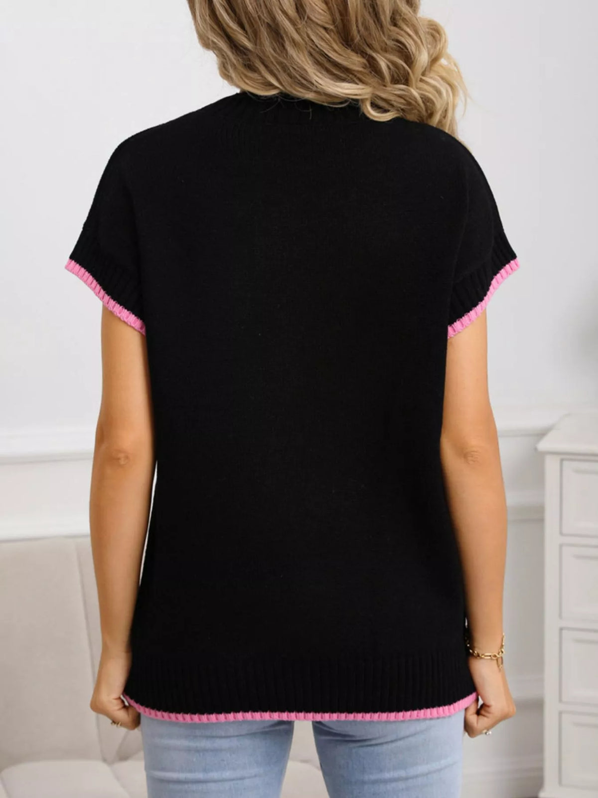Cute heart graphic sweater detail shot