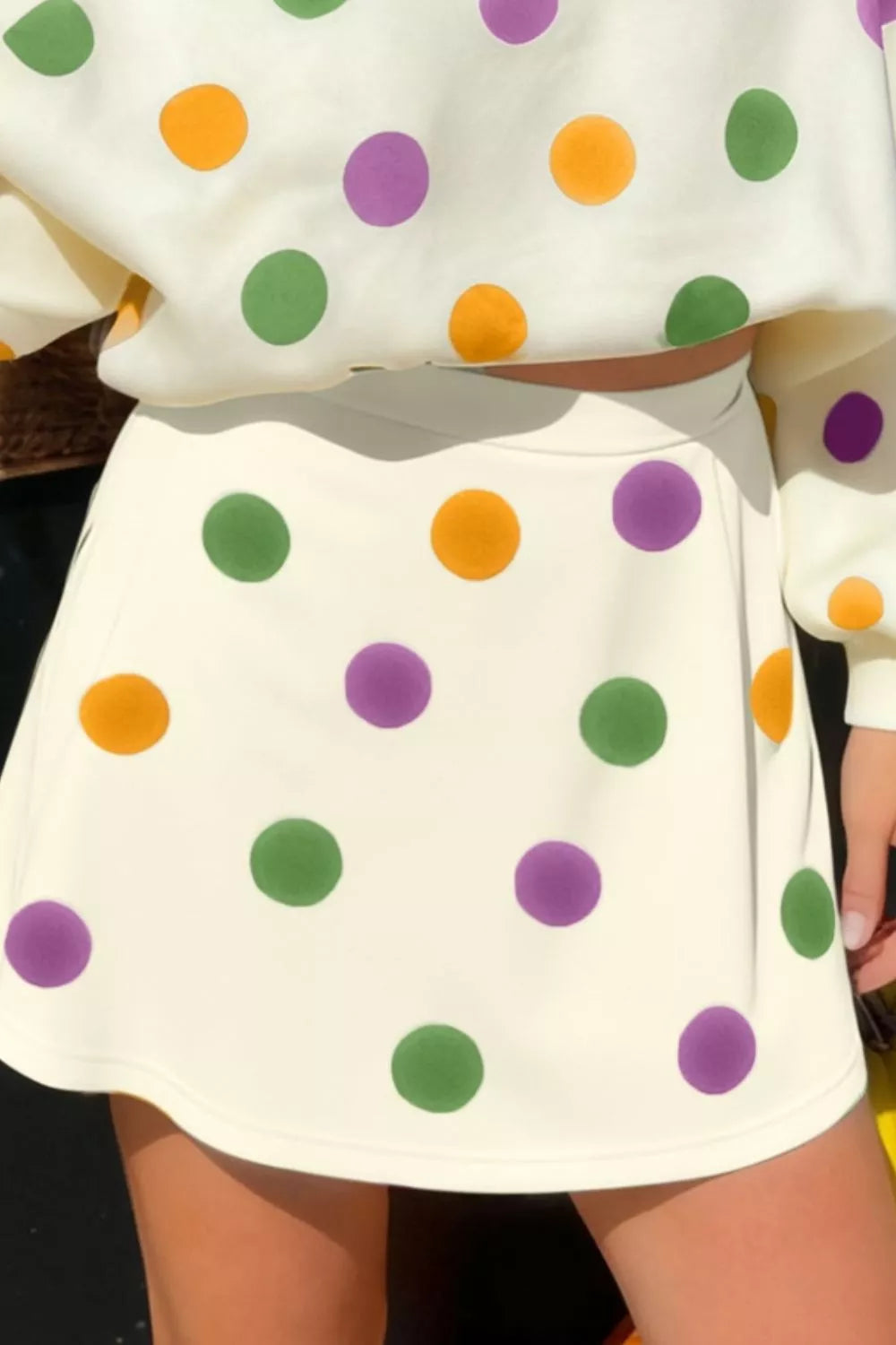 Polka dot v neck top neckline detail