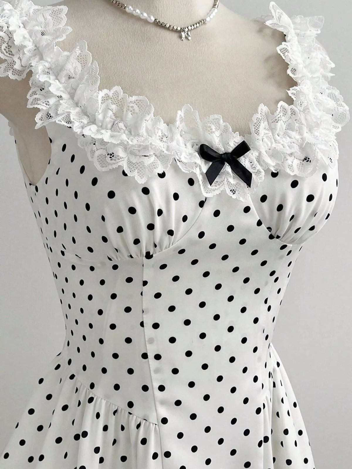 Close up of the lace trim and bow detail