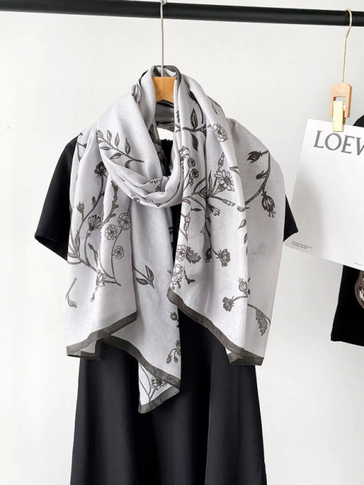 Soft floral scarf styled with a sweater