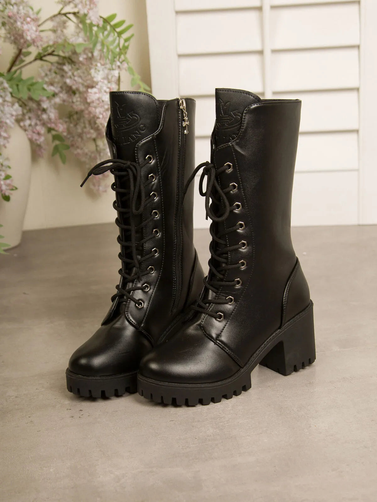 Black lace up block heel boots sole and tread