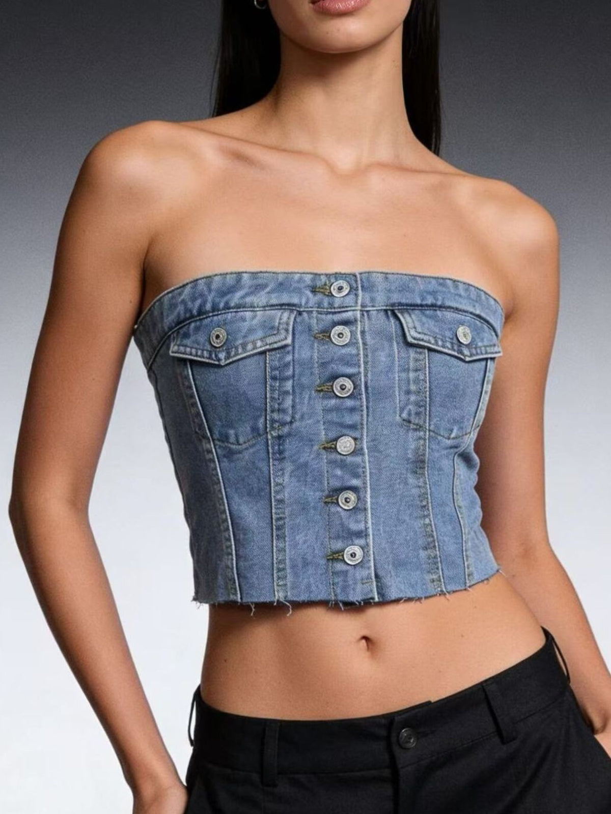 Button front denim top showing raw hem detail