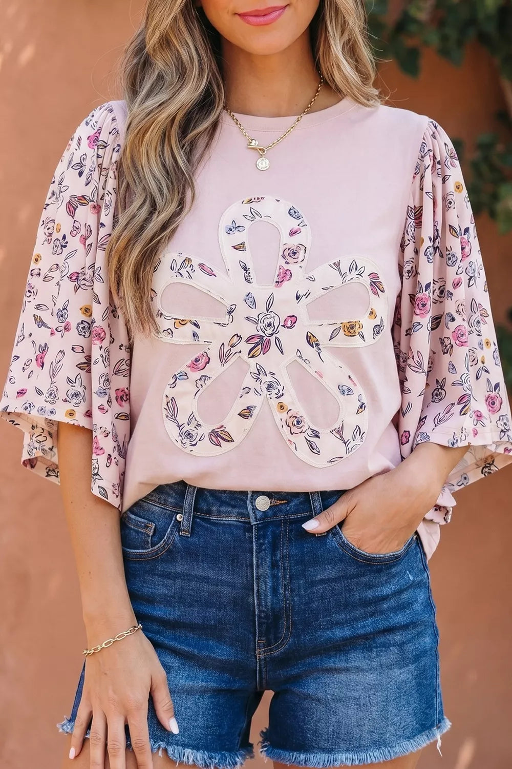 Dusty pink floral blouse patchwork fabric closeup