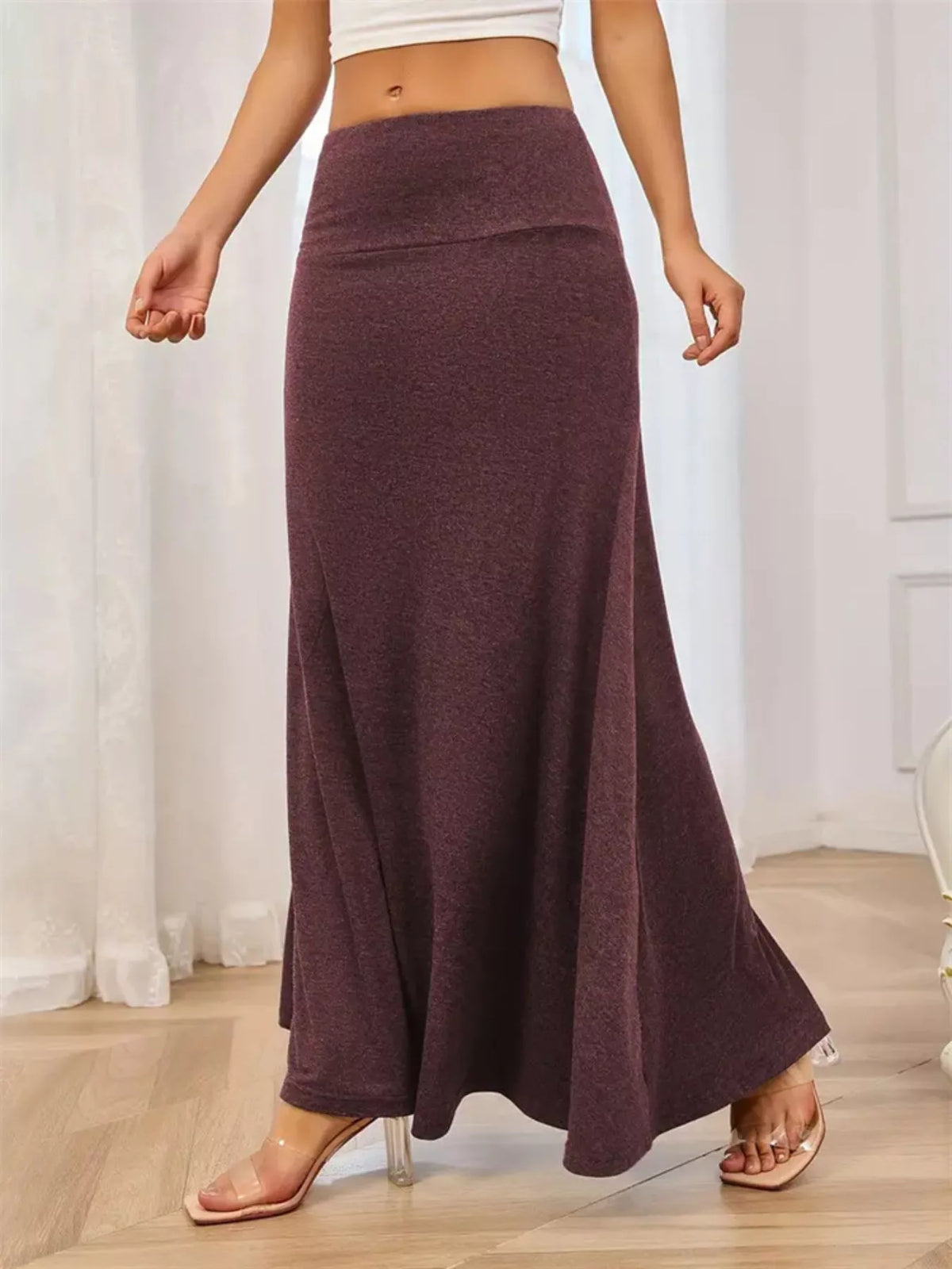 Wide waistband maxi skirt styled on model, three quarter view