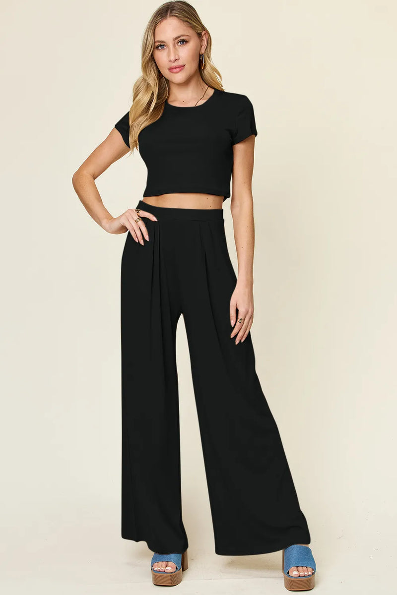 Round neck top and pants set shown as a full outfit
