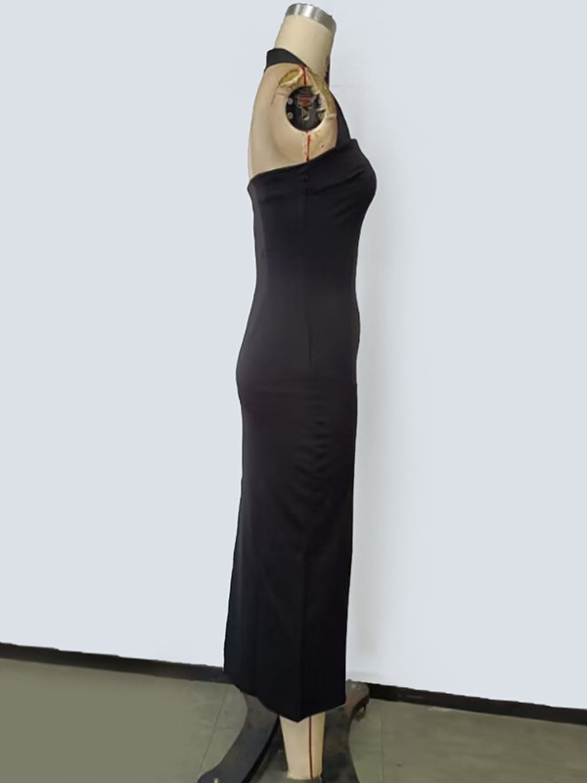 Close up of the stretch fabric and hem on the midi dress