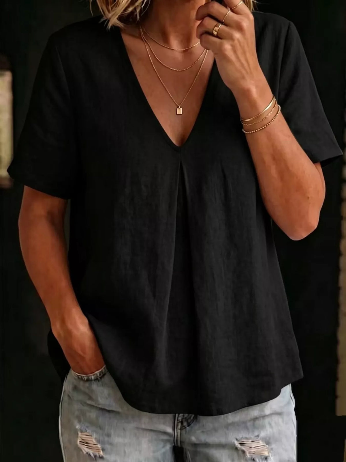 V neck pleated blouse showing soft drape