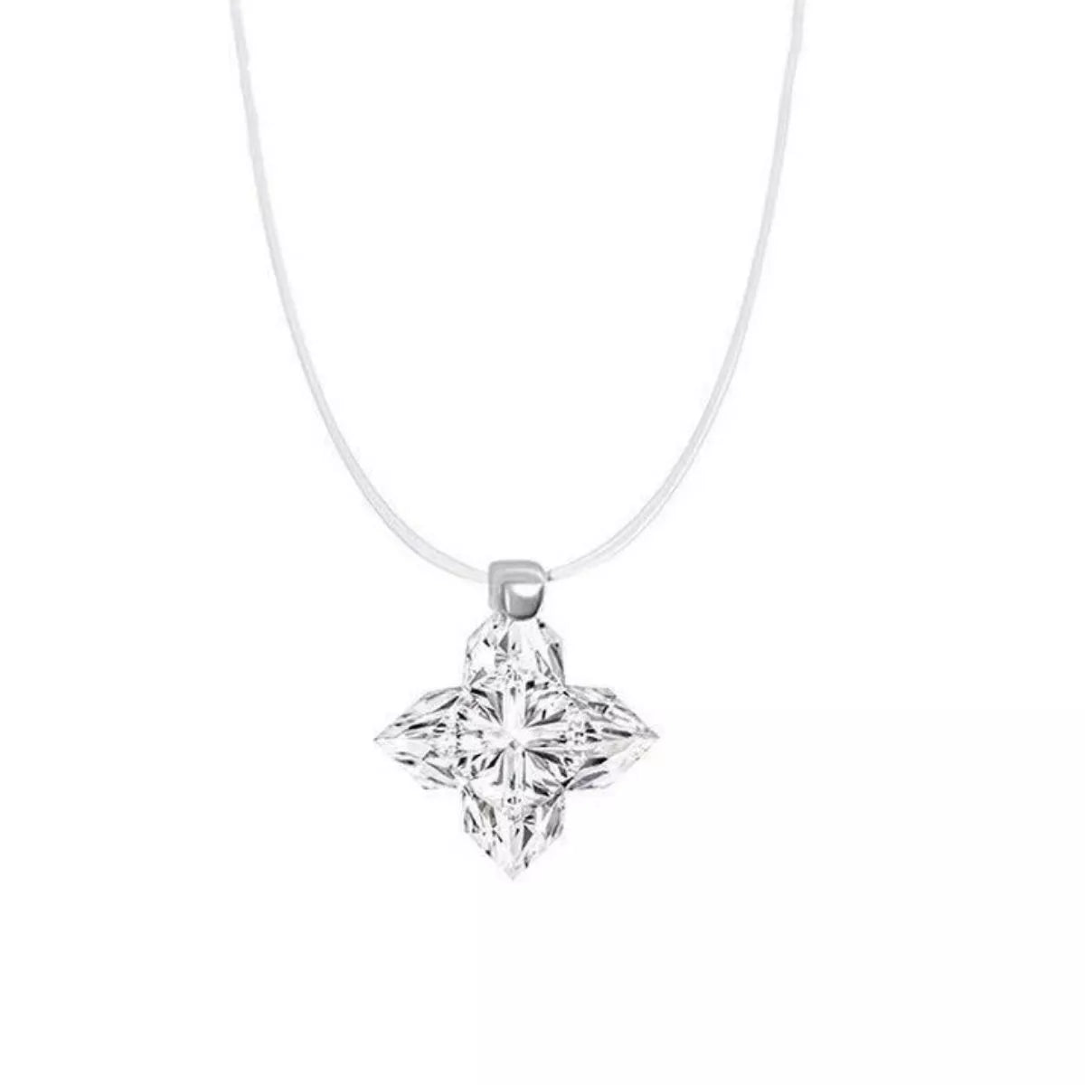 Silver star necklace shown with its matching box