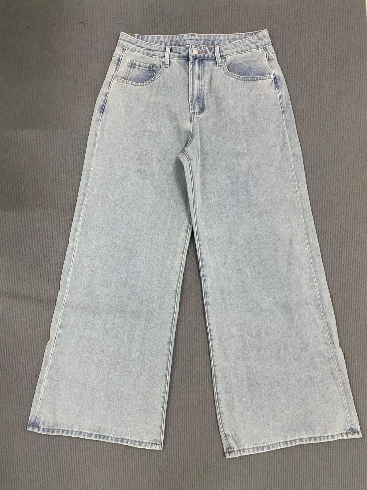 Washed denim fabric detail on wide leg jeans