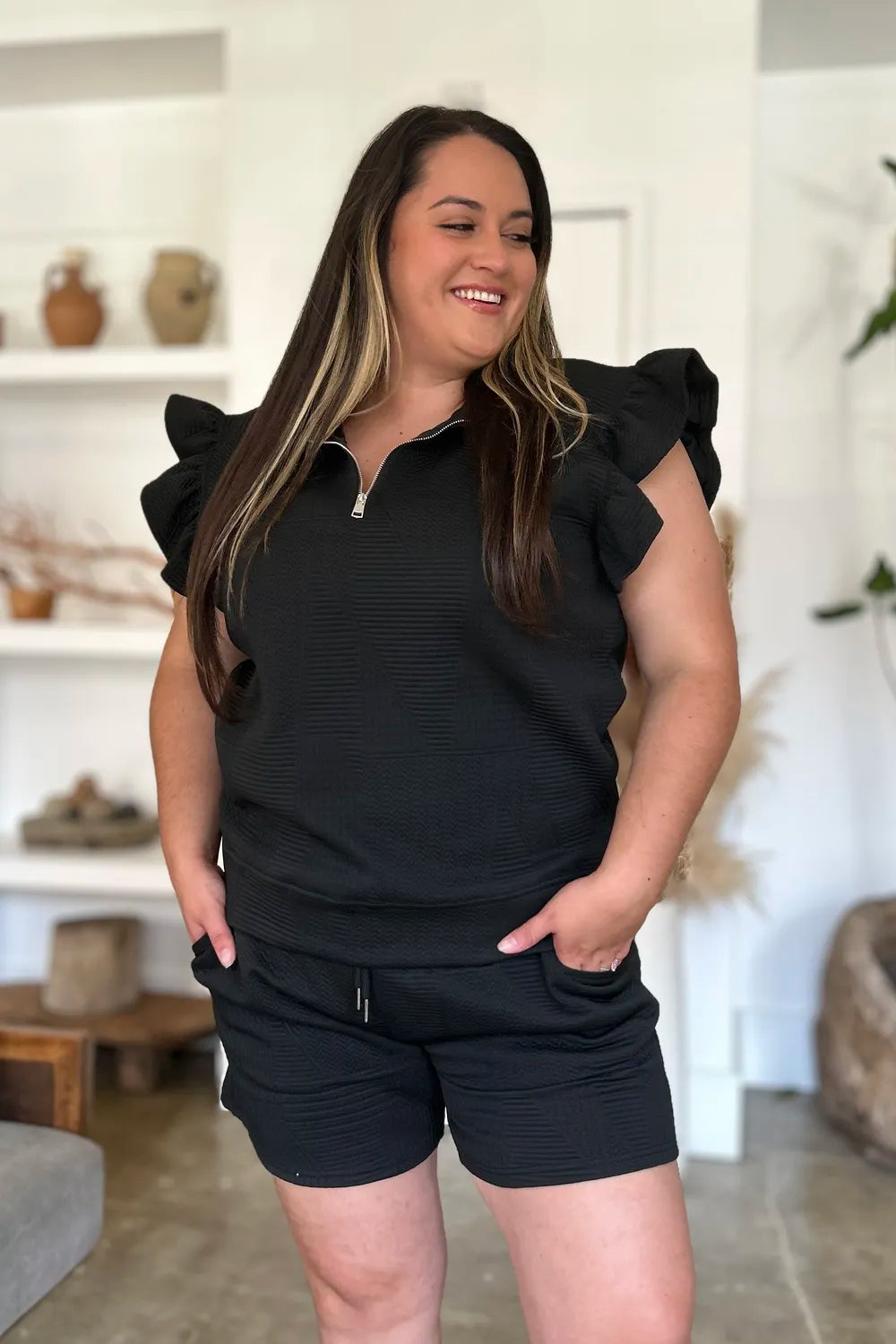 Back view of texture two piece top and shorts set