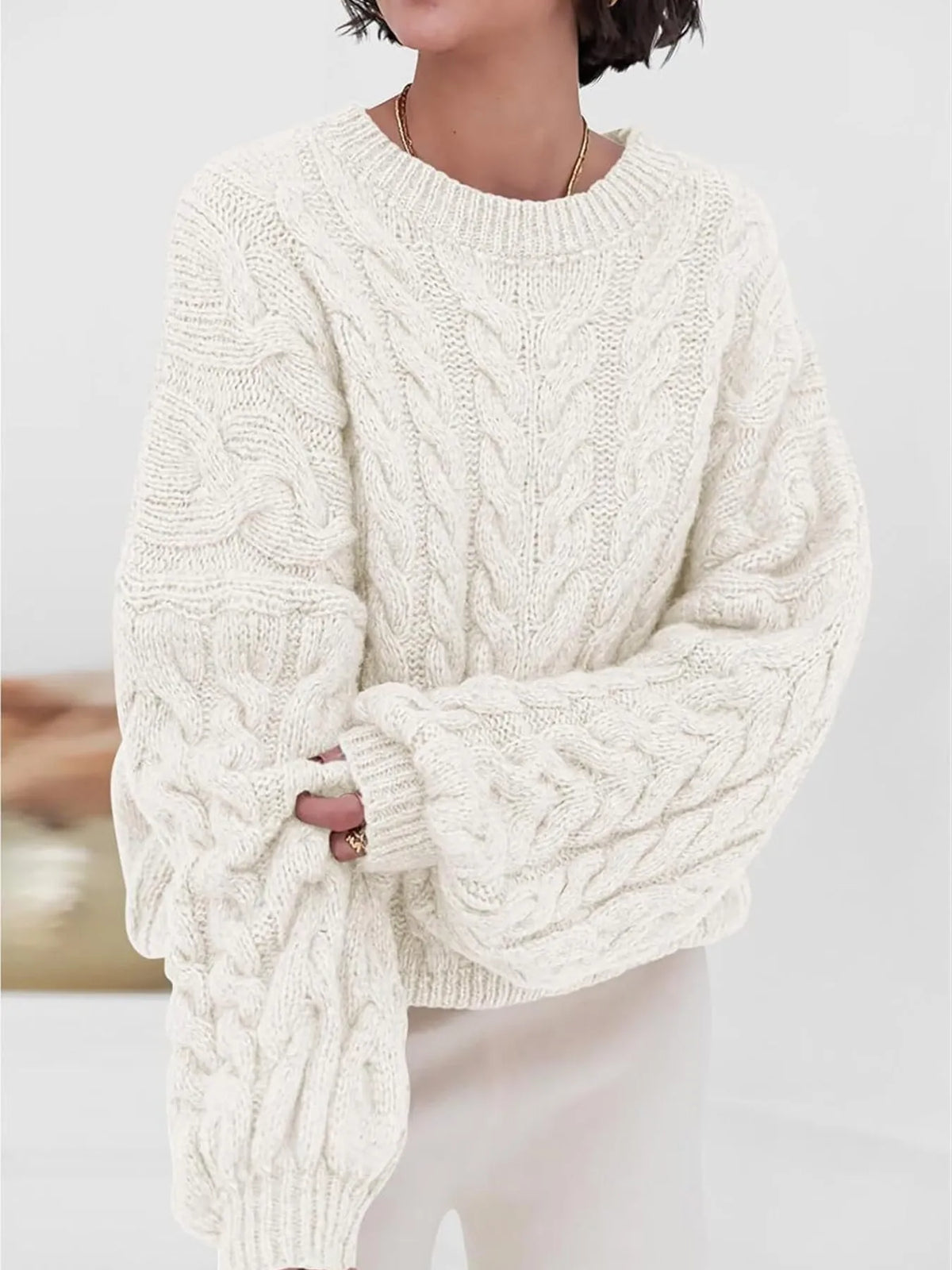 cable knit long sleeve sweater back view