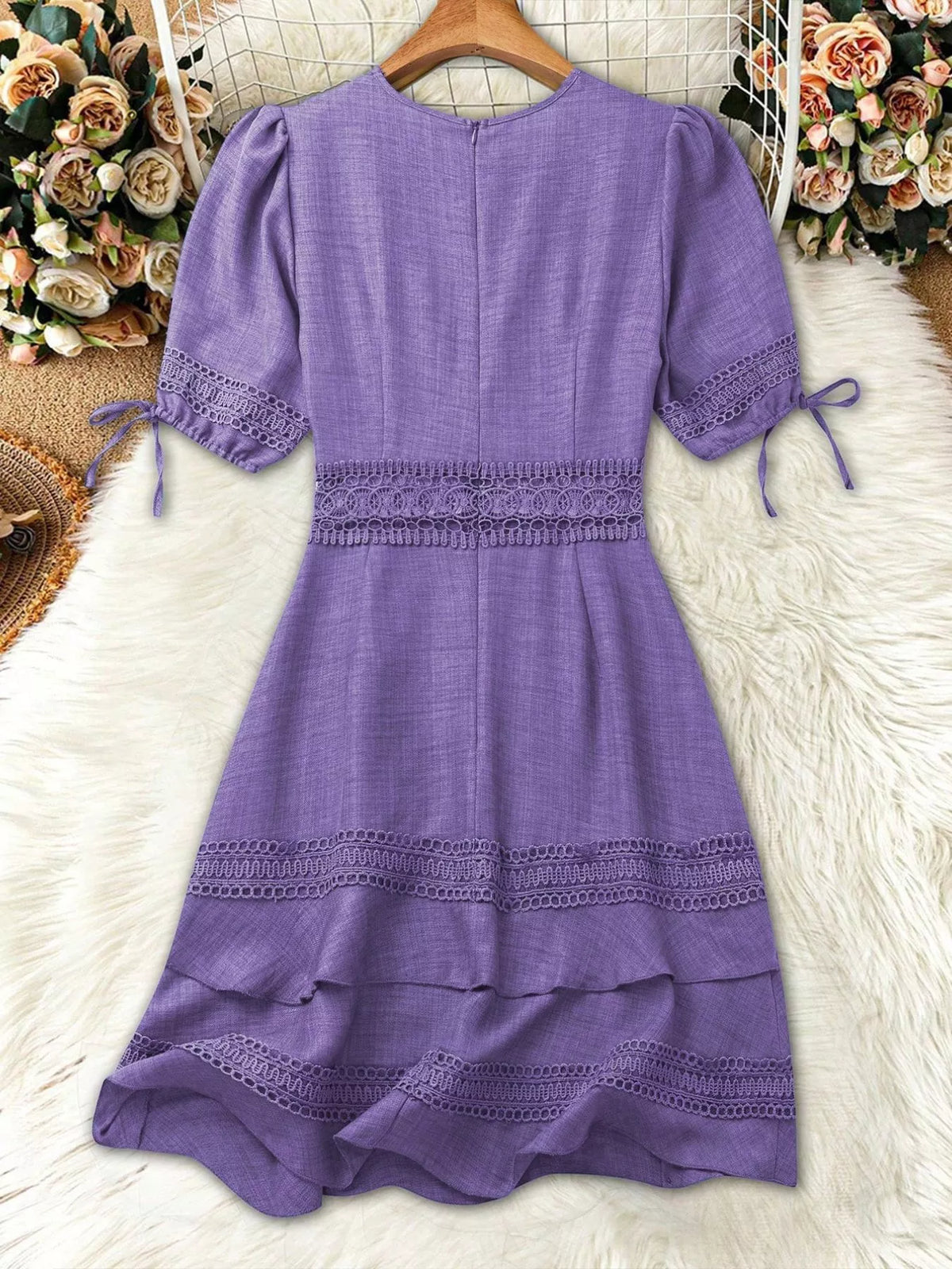 Lace dress shown in a bright colourway