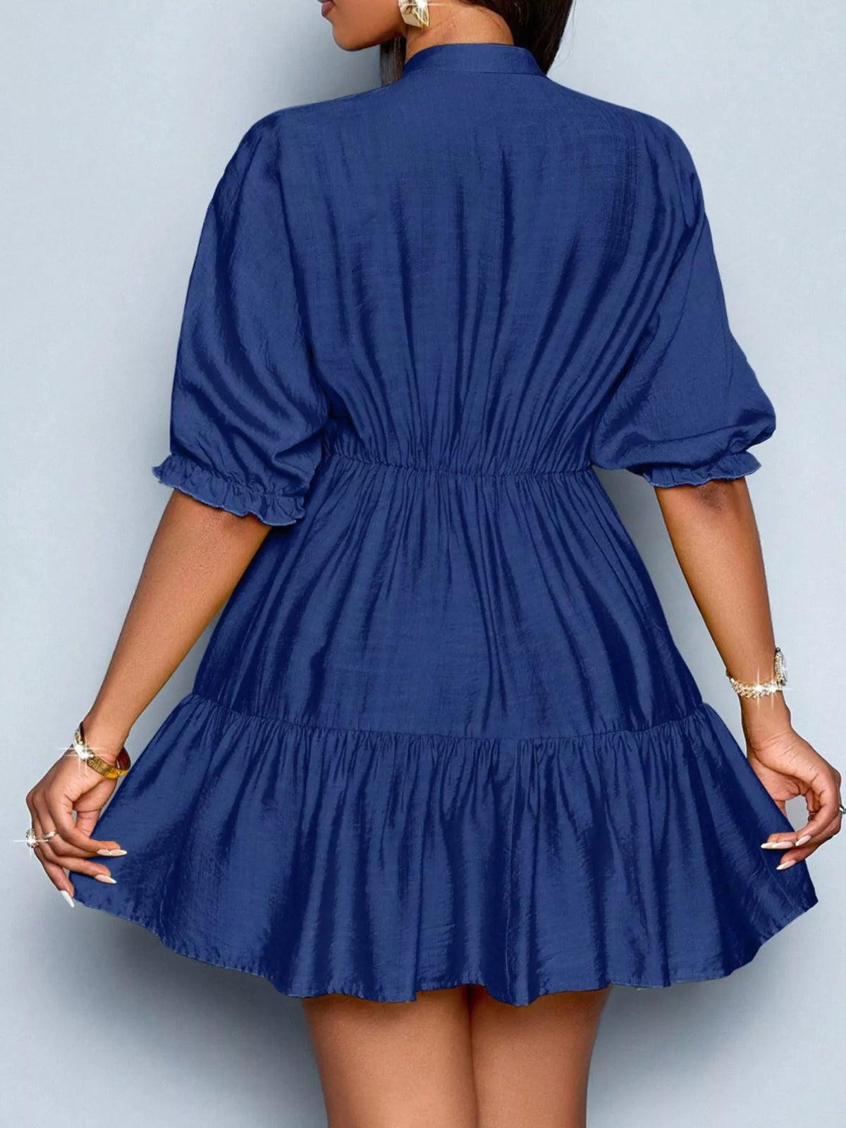 Close up of notched neckline on womens dress