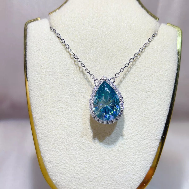 Pastel blue moissanite pendant necklace on sterling silver chain