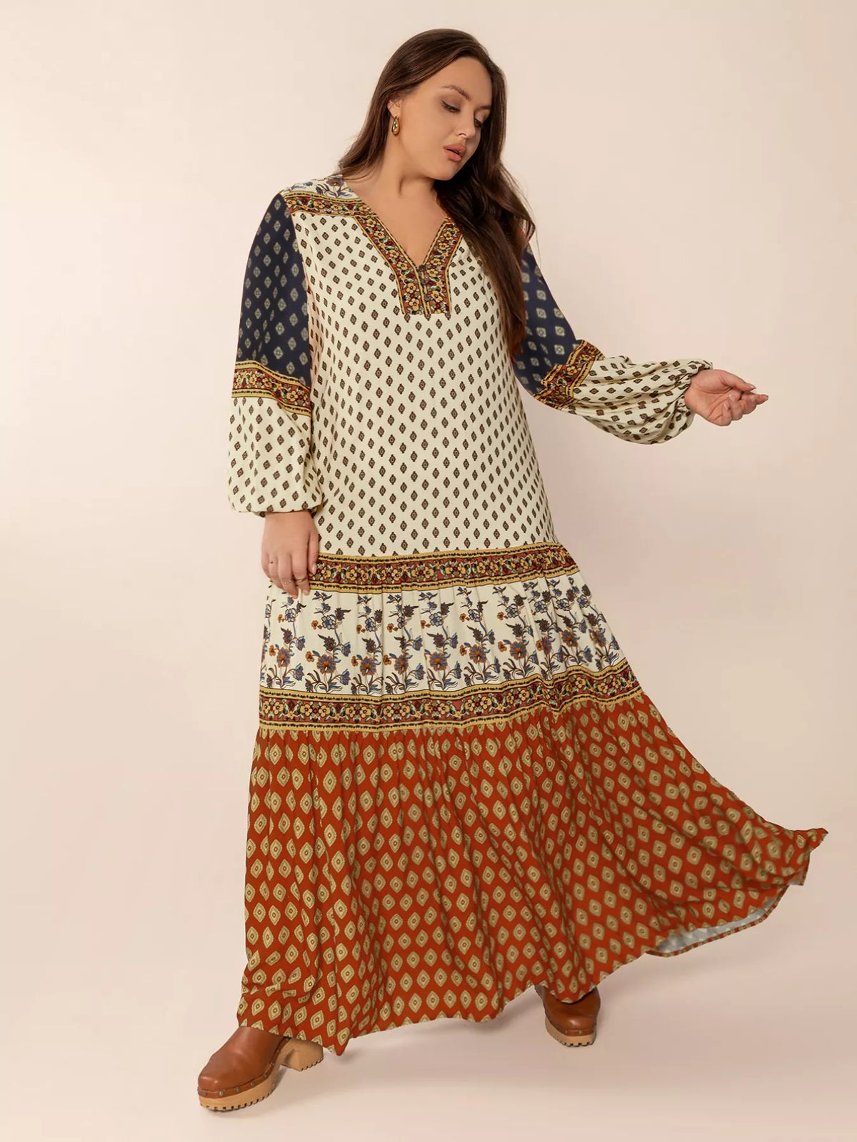 Side view of the caramel balloon sleeve maxi dress