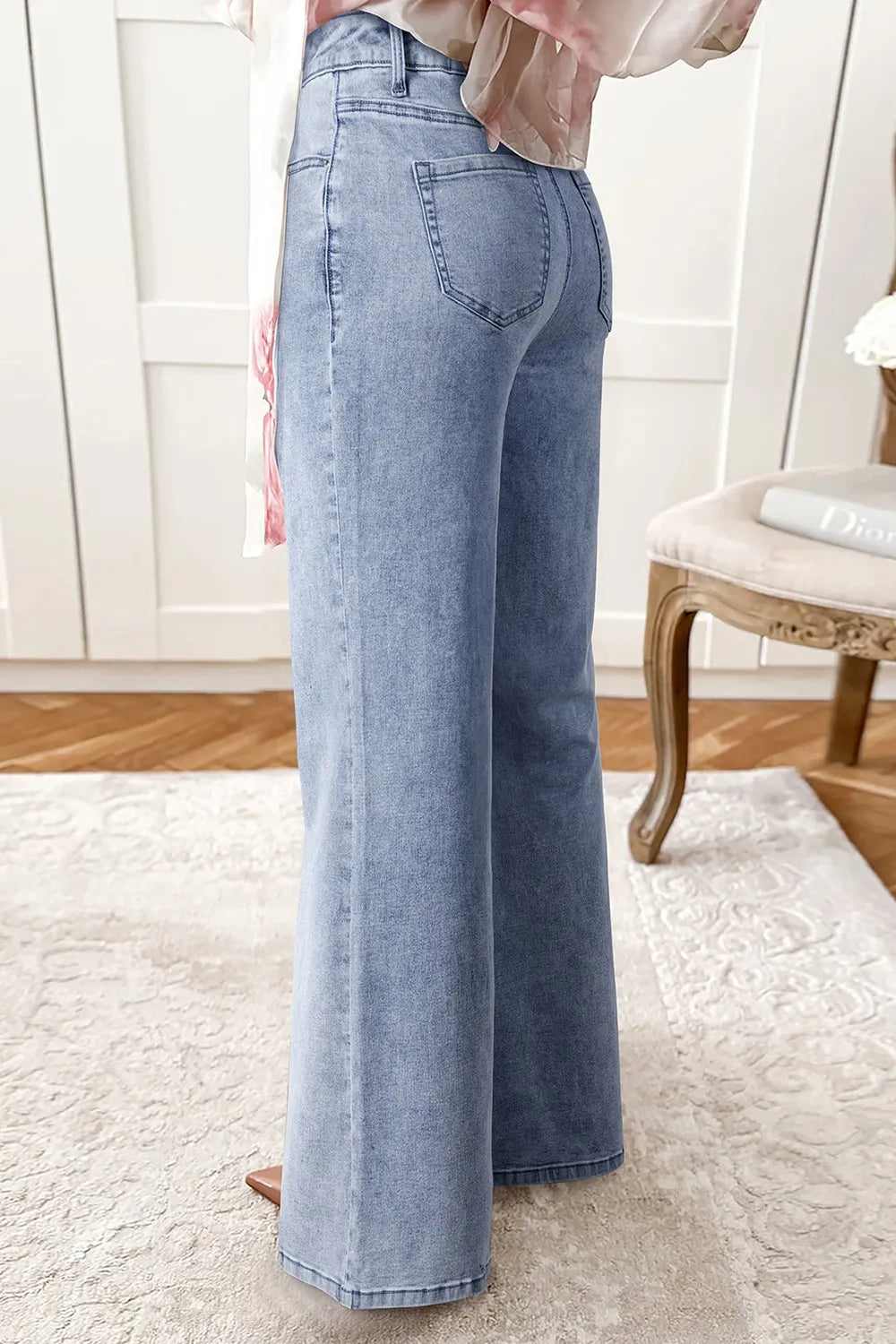 Wide leg flare jeans showing sweeping silhouette