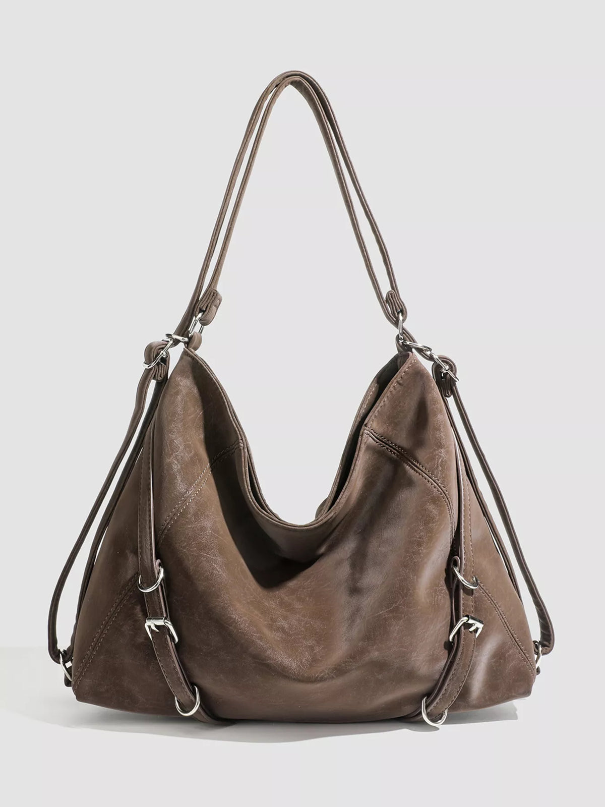 Vintage brown leather convertible shoulder bag front view