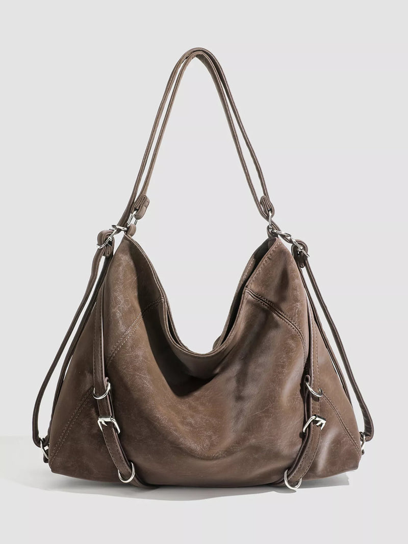 Vintage brown leather convertible shoulder bag front view