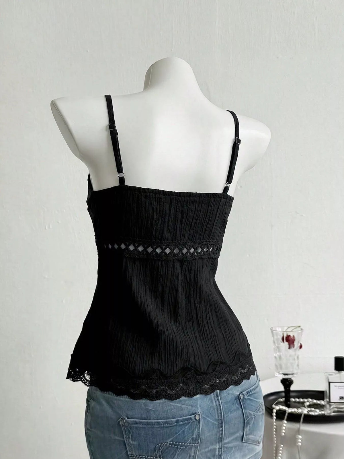 Close detail of the lace trim at the neckline