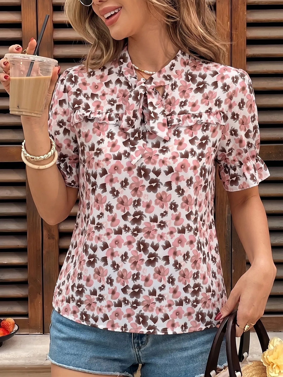 Pink floral tie neck ruffle blouse back view