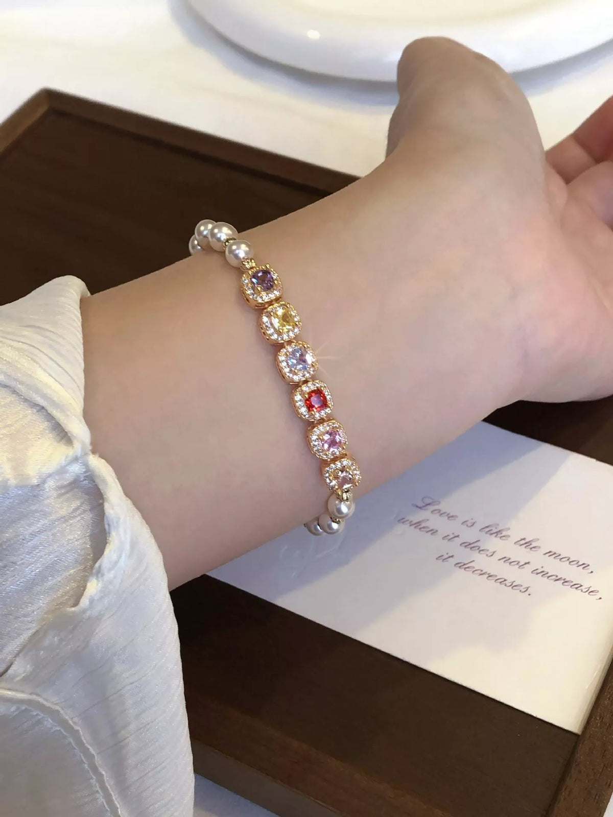 Pearl and zircon gold adjustable bracelet side view